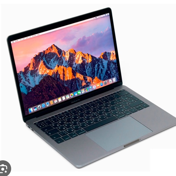 Pre- loved MacBook Pro with charging cable. - Picture 3 of 3